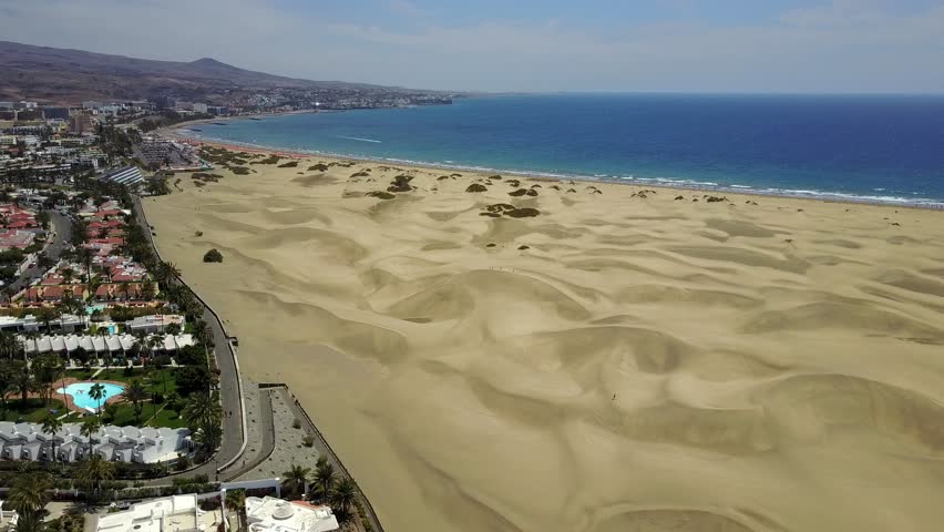 Amazing aerial views of the Gran Canaria island Maspalomas dunes in Spain. City by the desert. | Shutterstock HD Video #26886706