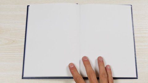 Top view of the opening blank book. Opening a book with blank pages. 