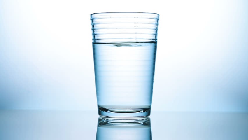 Glass of Water with Drop Stock Footage Video (100% Royalty-free) 26890606 |  Shutterstock