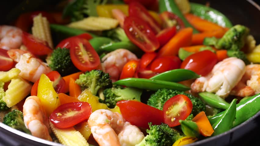 Cooking asian vegetable stir fry and shrimp macro Royalty-Free Stock Footage #26890933