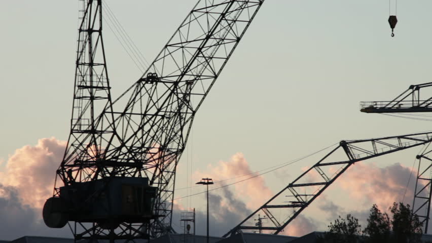 cranes moving in a construction site