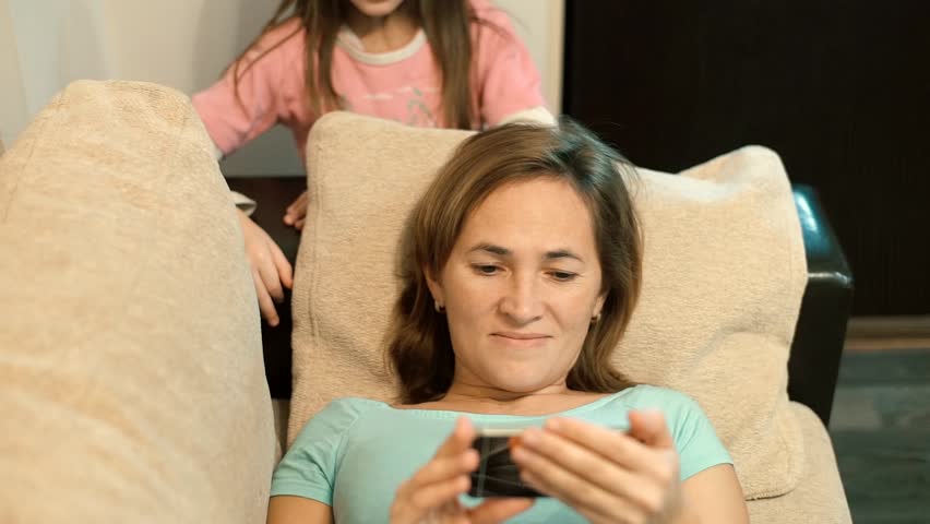 Daughter watches mom