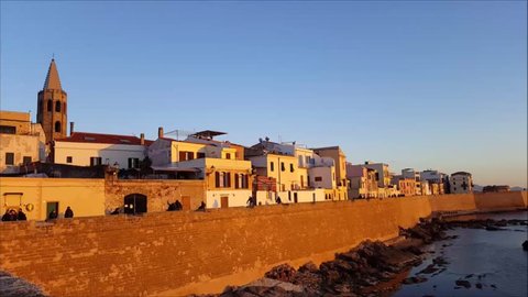 
sunset on the ramparts of Alghero; old town