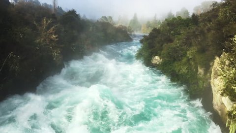 Waikato River wild rushing stream of Huka Falls near Lake Taupo in the North Island of New Zealand