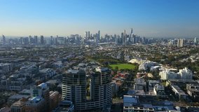 4k aerial video of Port Melbourne and view of skyline in CBD