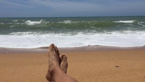 Closeup shot of male legs over tropical sunny beach outdoors background. Travel vacation relaxation concept. Having good time and healthy lifestyle. Full HD video 85941