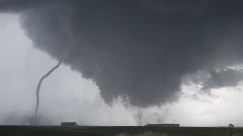 A rope tornado moves in front of a wedge tornado near Wakefield, Nebraska