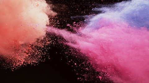 Colorful powder. red powder,pink powder,purple powder,Powder exploding against black background. Shot with high speed camera, phantom flex 4K. Slow Motion.