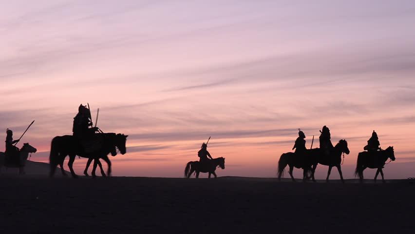 Horsemen warriors silhouetted, Medieval Cavalry attacks the Enemy Royalty-Free Stock Footage #26946622