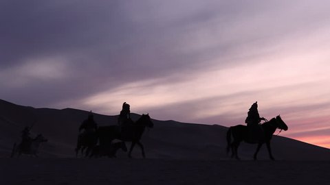 Horsemen warriors silhouetted, Medieval Cavalry attacks the Enemy