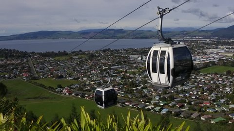 Gondola cable car lift  ride above Rotorua lake and city, in the center of North Island of New Zealand
