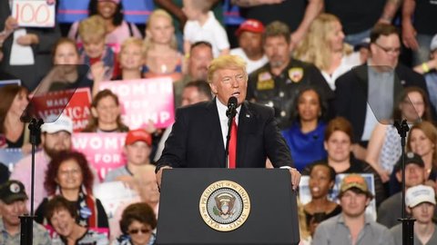 HARRISBURG, PA - APRIL 29, 2017: President Donald Trump discusses his absence  from the white house correspondents dinner during a rally held at The Farm Show Complex and Expo Center