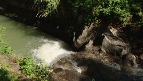 Fast running mountain stream in the rainforest, Grenada