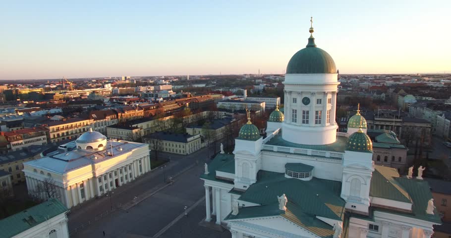 Aerial view drone footage of Helsinki old Orthodox cathedral area near sea terminal Katajanokka and harbour with city skyline and Baltic Sea view in the capital of Finland, northern Europe