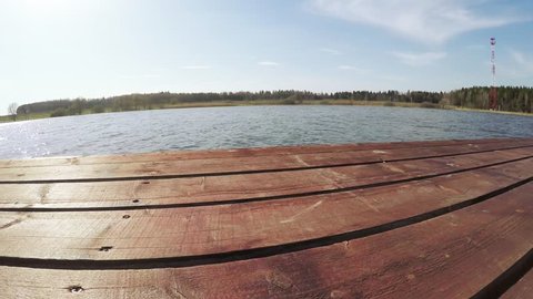 Dynamic panorama on the edge of a wooden platform