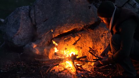 Neanderthal Man Warms His Hands の動画素材 ロイヤリティフリー Shutterstock