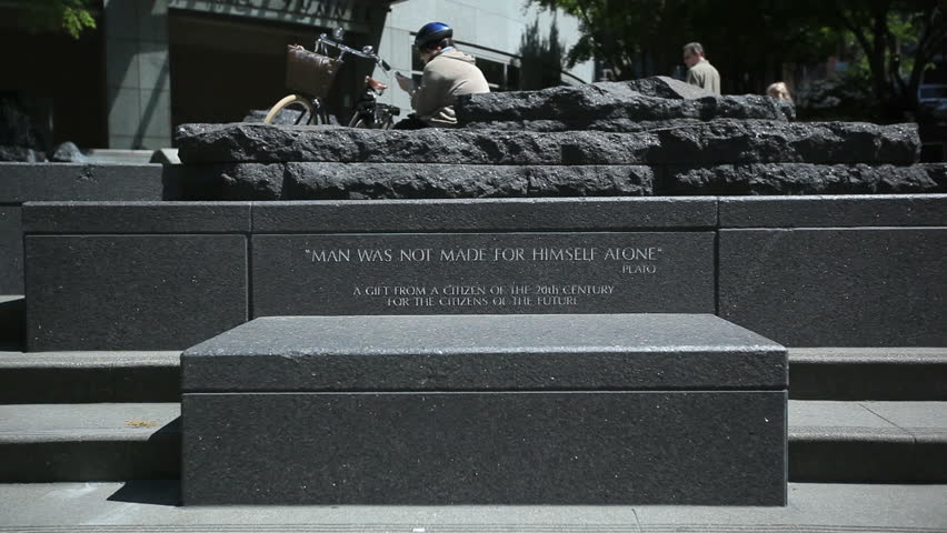 SEATTLE, USA - MAY 12: Stone Monument with bench in the City during daytime on