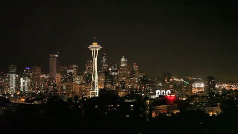SEATTLE, USA - MAY 11: Seattle Skyline at night on May 11th 2012 in Seattle, USA. Space Needle in new orange painting for 50 year anniversary of the world exhibition in 2012.