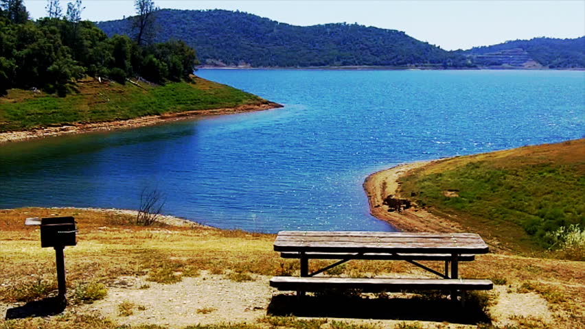 A quiet cove and picnic table on New Melones Lake in Calaveras County near