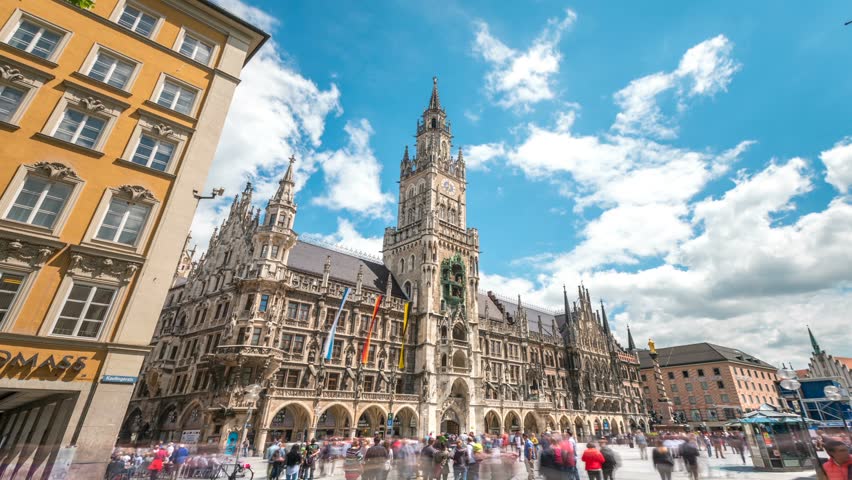 Tourists at the Marienplatz street in Munich view in front of Town Hall. The Marienplatz is central square in the city centre of Munich, Germany. Hyperlapse footage  Royalty-Free Stock Footage #27019984