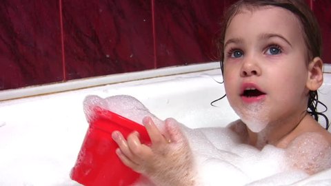 child in bath 