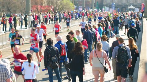 Prague Czech Republic April 17 2017: Sportisimo Half Marathon Race, people watching runners up close, fully crowded scene