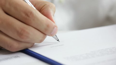 Businessman signing a contract. Signature is fake