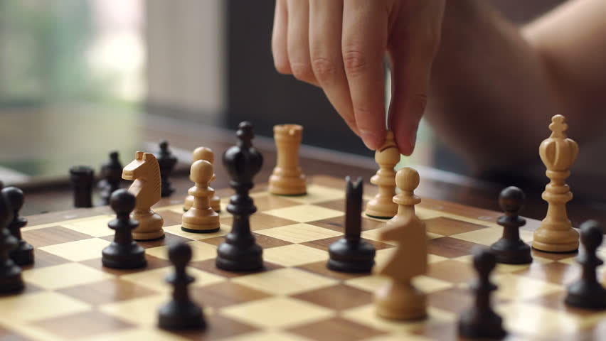 man-moving-wooden-chess-piece-image-free-stock-photo-public-domain