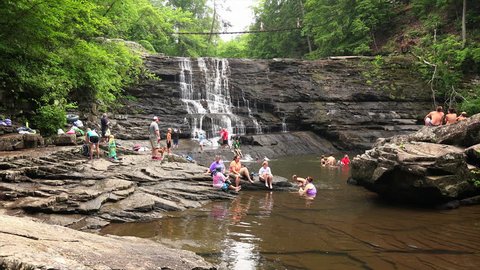 FALL CREEK FALLS STATE PARK, TENNESSEE - JULY 5th: Bathers enjoy soaking in Cane Creek Falls at Fall Creek Falls State Park in Spencer, Tennessee on July 5th, 2016.