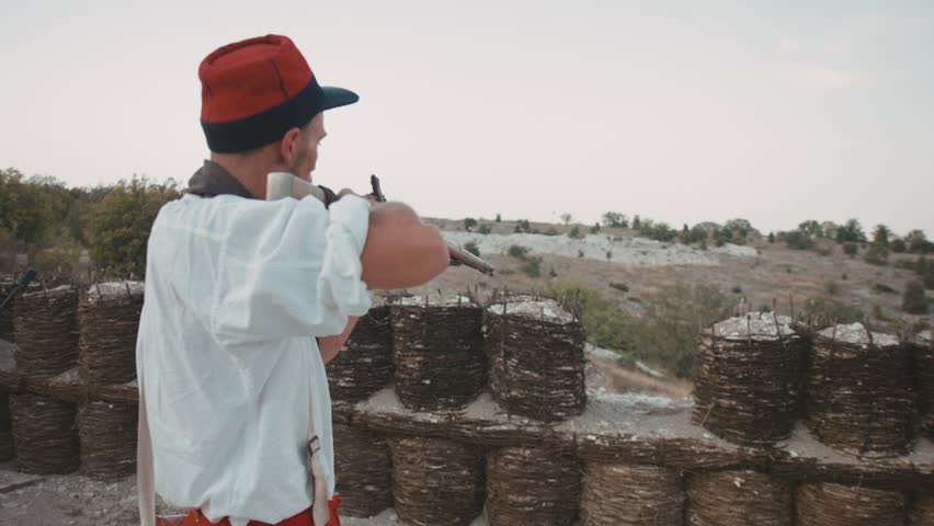 French soldier shoots from the gun outdoors