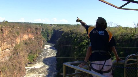 SOUTH AFRICA - Circa 2009: Bungee jumping from Victoria Falls Bridge in Zimbabwe
