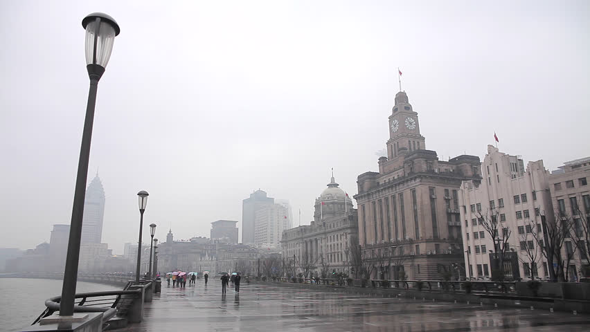 Raining Day in Shanghai Bund, People taking a Walk near the Bund
