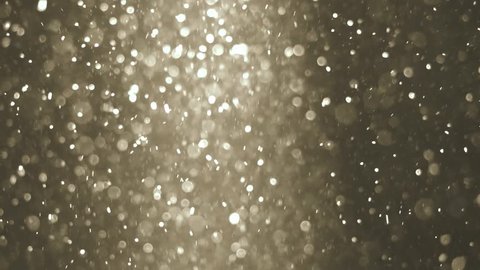 Abstract silver background with beautiful shine flickering particles. Underwater bubbles in flow with bokeh. 3840x2160, 4k