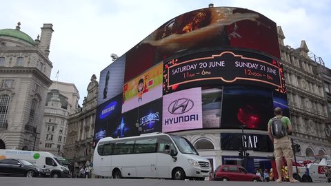 LONDON, MAY 19, 2017 4K Traffic at Piccadilly Circus in London, Tourists Walking, Crossing the Street