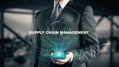 Businessman with Supply Chain Management hologram concept