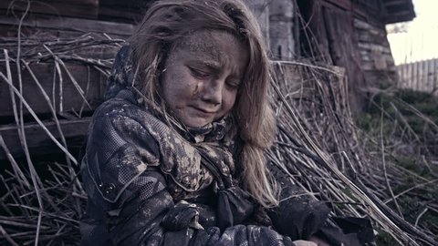A hungry homeless child cries. War.