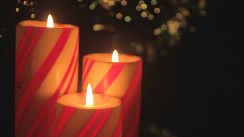 closeup trio red christmas pillar candles Stock Footage Video (100%