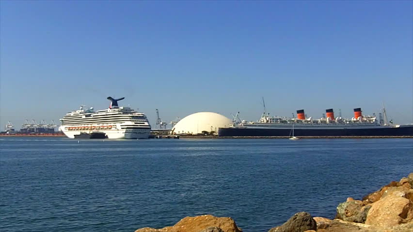 LONG BEACH, CA - AUGUST 5: A modern cruise ship is moored next to the historic