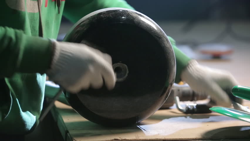 Preparation of a curling stone for the game