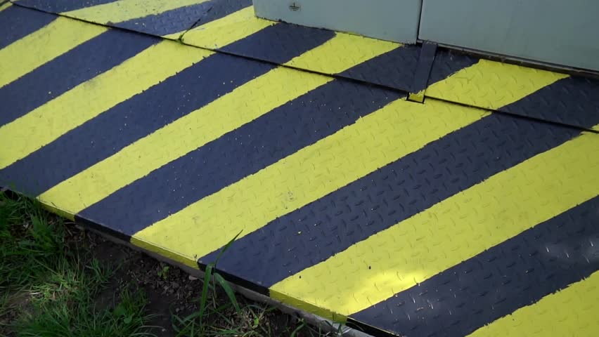 Black and yellow danger warning sign. Attention.