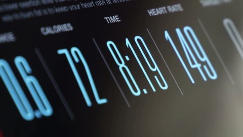 Fitness App displaying exercise data on tablet screen timelapse.