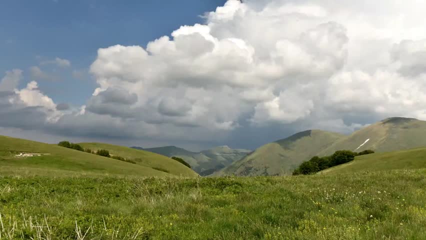 
Clouds running in the mountains, italian mountain landscape
