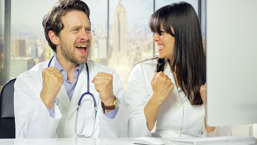 Happy successful doctors in office dancing synchronized slow motion retro styl