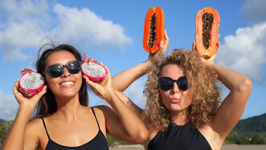 Summer Girls Dancing With Fruits On Vacation on Beach. Slow Motion. HD, 1920x1080. 