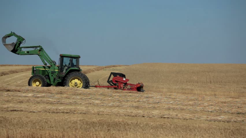 Alberta Canada - August 18, 2012 Harvesting wheat