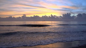 The sunrise over the serene ocean 720 HD video