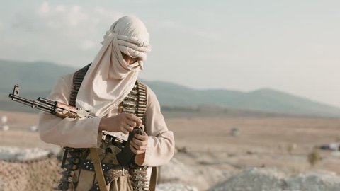 Armed mujahid in the field