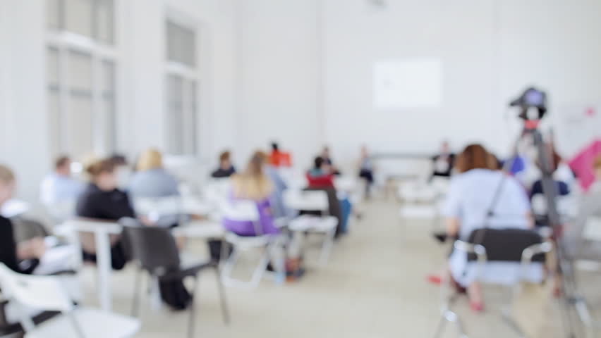 Blur background of business seminar and presentation in the conference hall