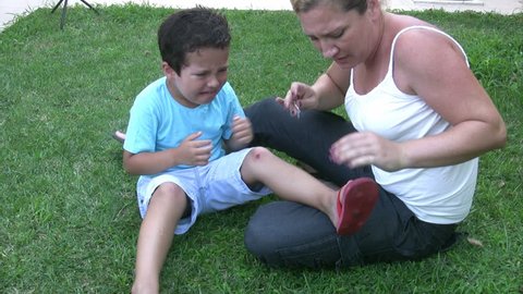 Injured little boy crying