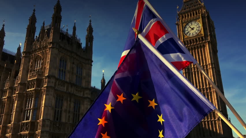 European Union and British Union Jack flag flying in front of Big Ben and the Houses of Parliament at Westminster Palace, London, in symbol of the Brexit EU referendum Royalty-Free Stock Footage #27150775